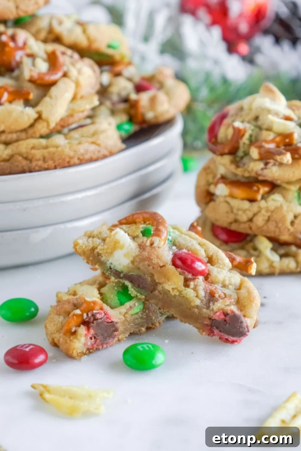 bite taken out of cookies on table and stacked on top of each other on table