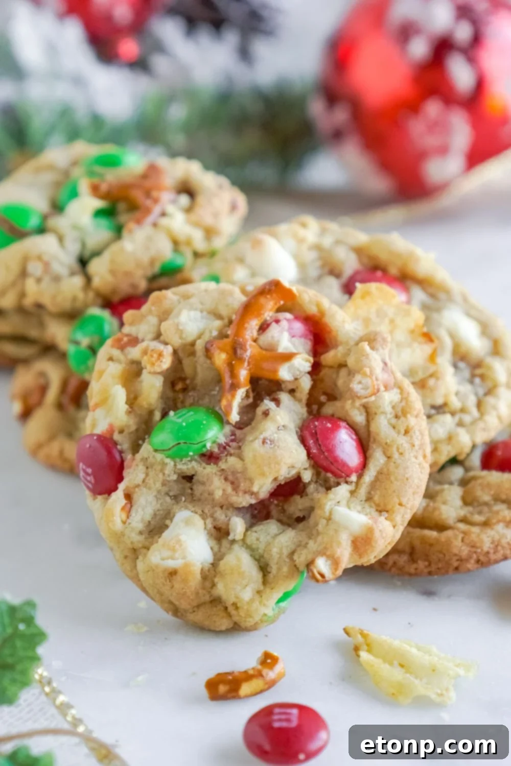 cookies with mix in ingredients around the cookies on the table