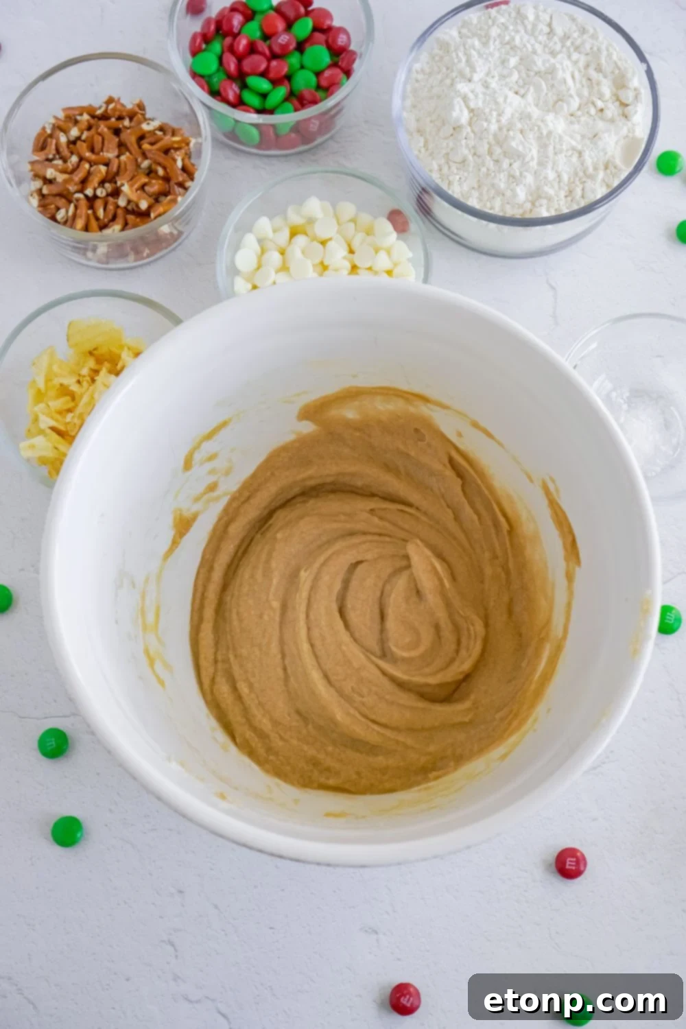 wet ingredients for cookie dough mixed in a white bowl