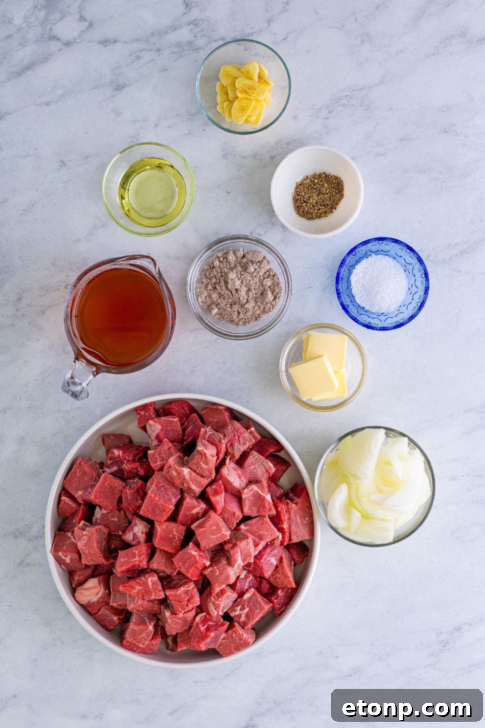 ingredients for slow cooker steak bites on table in bowls
