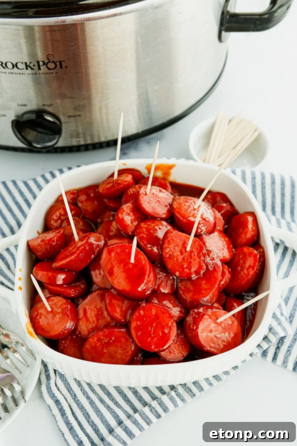 A festive bowl of Crockpot Kielbasa Bites, perfectly glazed and ready for serving at a party or game-day event.