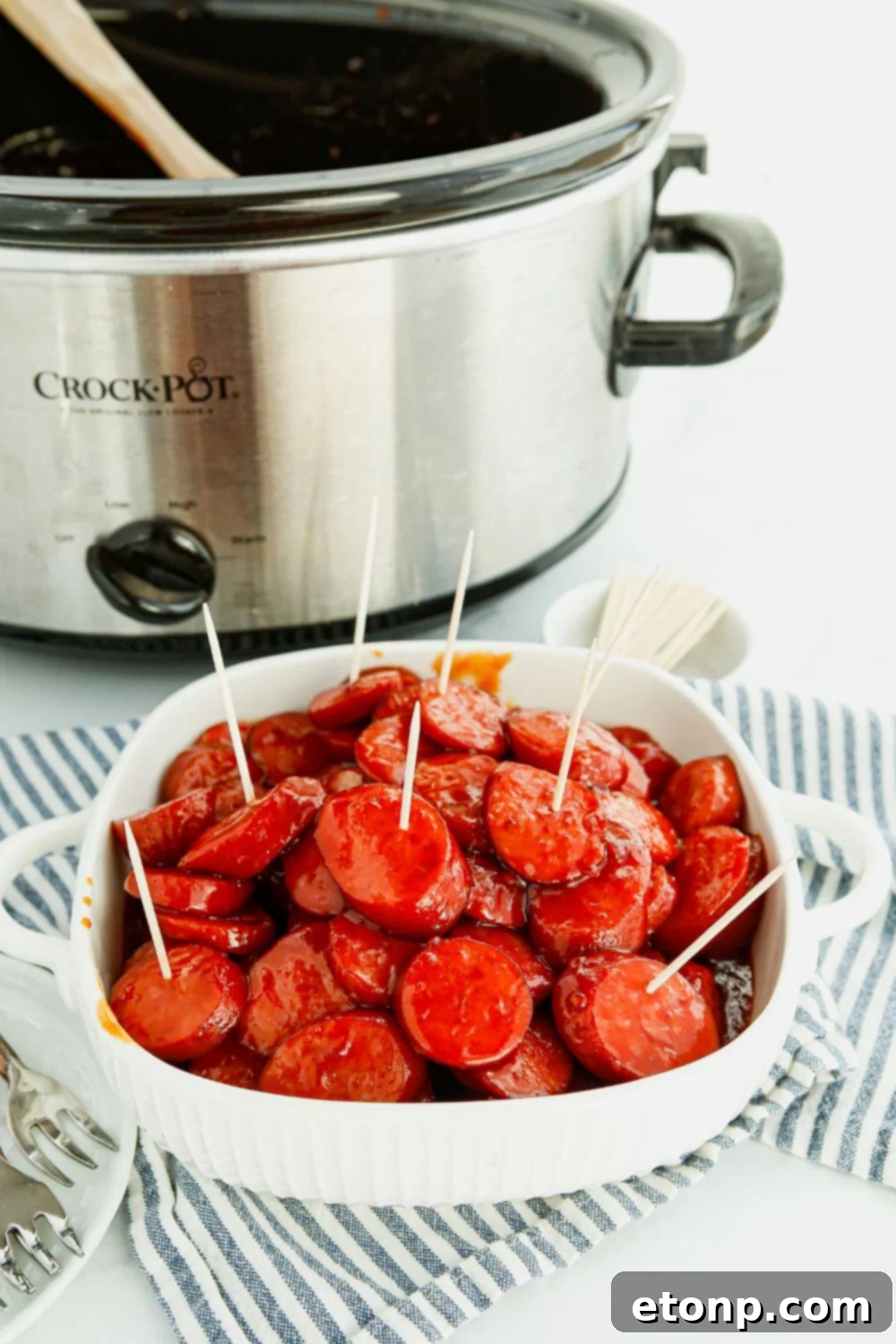 A vibrant display of glazed kielbasa appetizers, ready for a party.