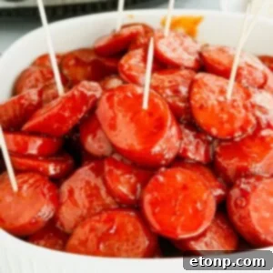 Crockpot Kielbasa Bites in a pan on table