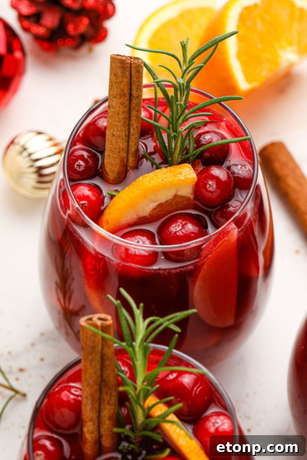sangria in glasses with garnishes on it