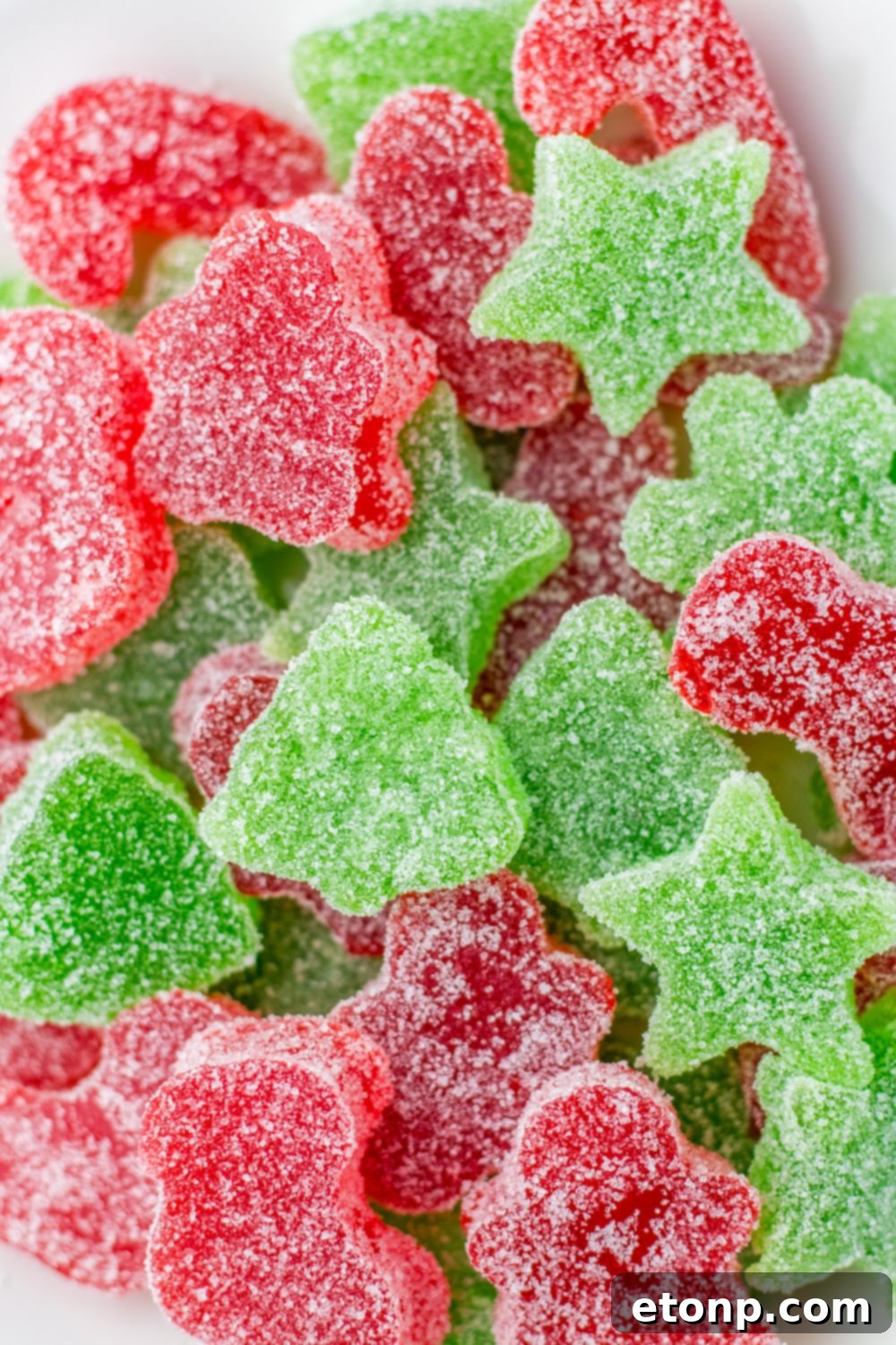 Holiday Gumdrop Gems 3 Stacked gummy drop candies, glistening with sugar, on a serving plate