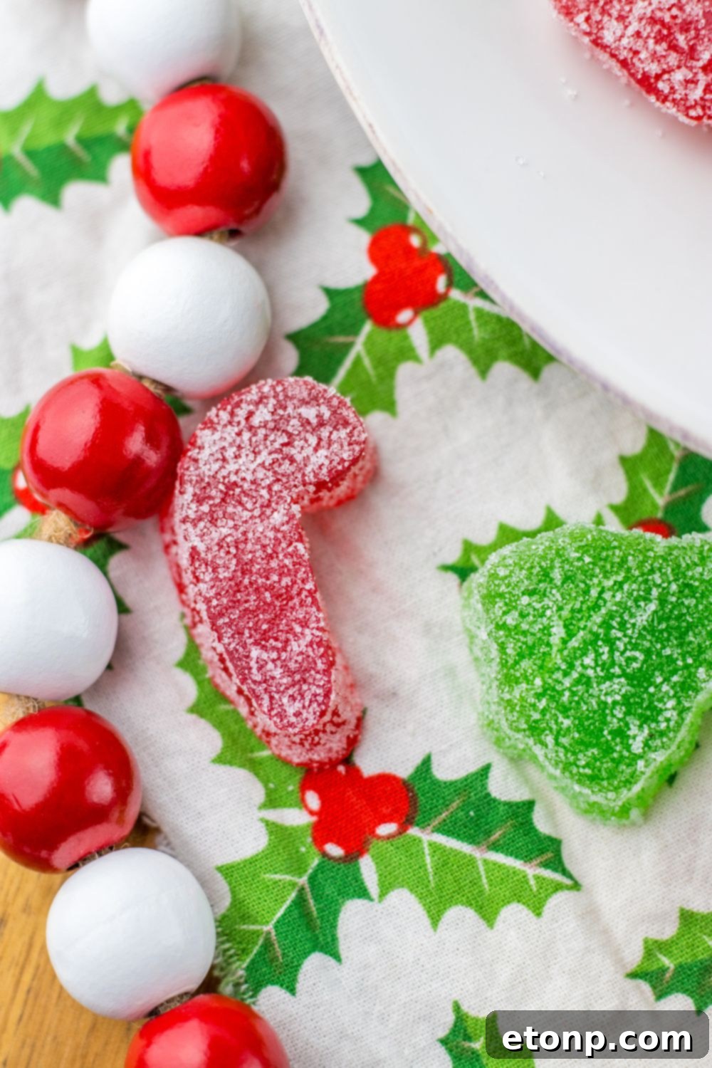 Holiday Gumdrop Gems 4 Christmas themed gum drops displayed on a table surrounded by holiday decor