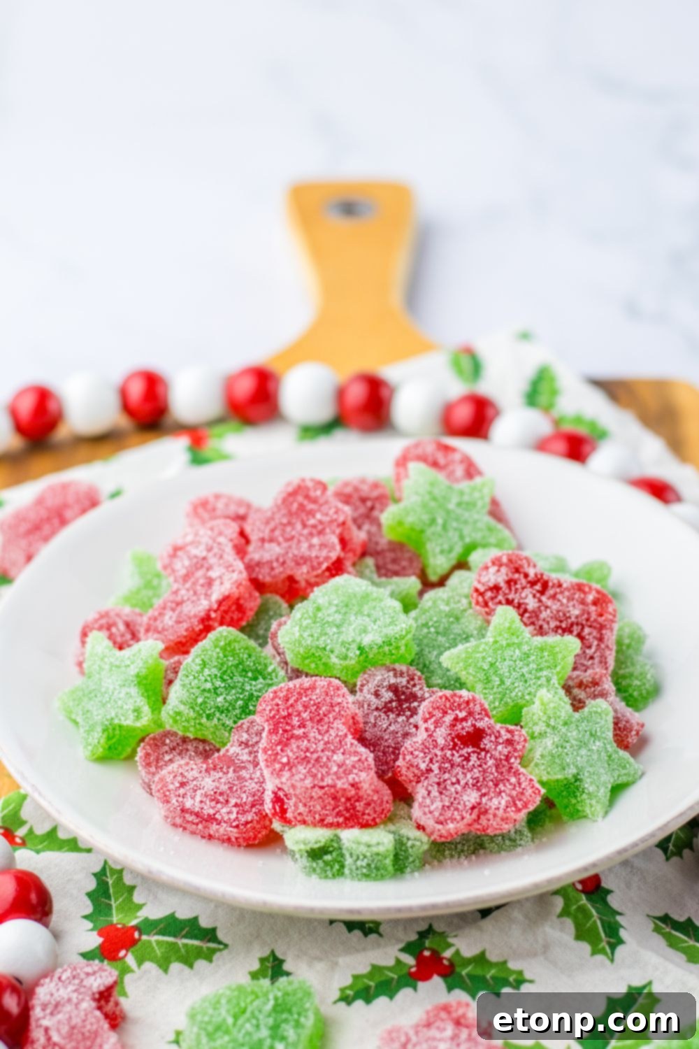 Holiday Gumdrop Gems 5 A selection of colorful gumdrops neatly arranged on a white plate