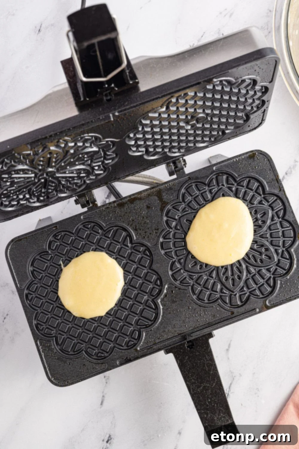 Pizzelles 13 batter in the center of the iron