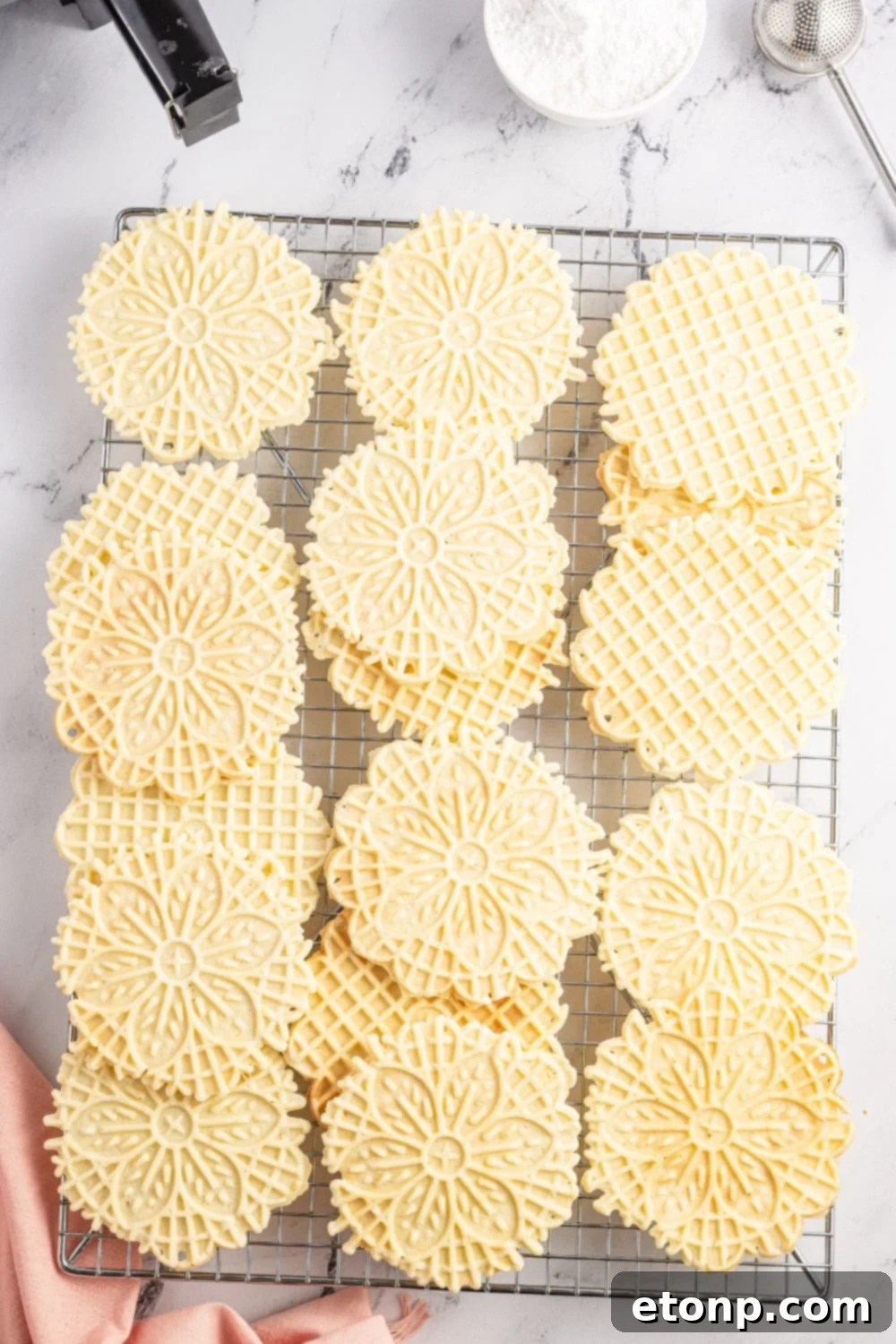 Pizzelles 15 Pizzelles on a cookie tray