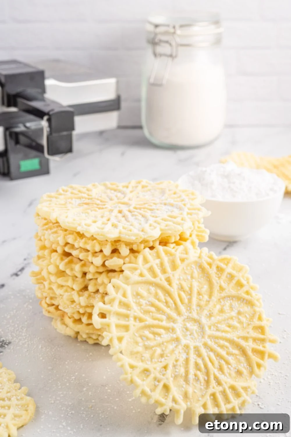 Pizzelles 18 Pizzelles on tray with ingredients behind it