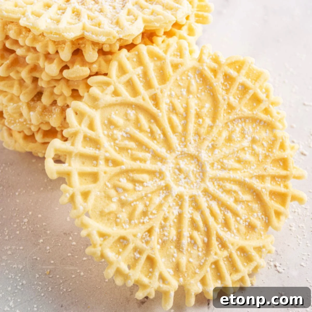 Pizzelles 3 Pizzelles on marble table