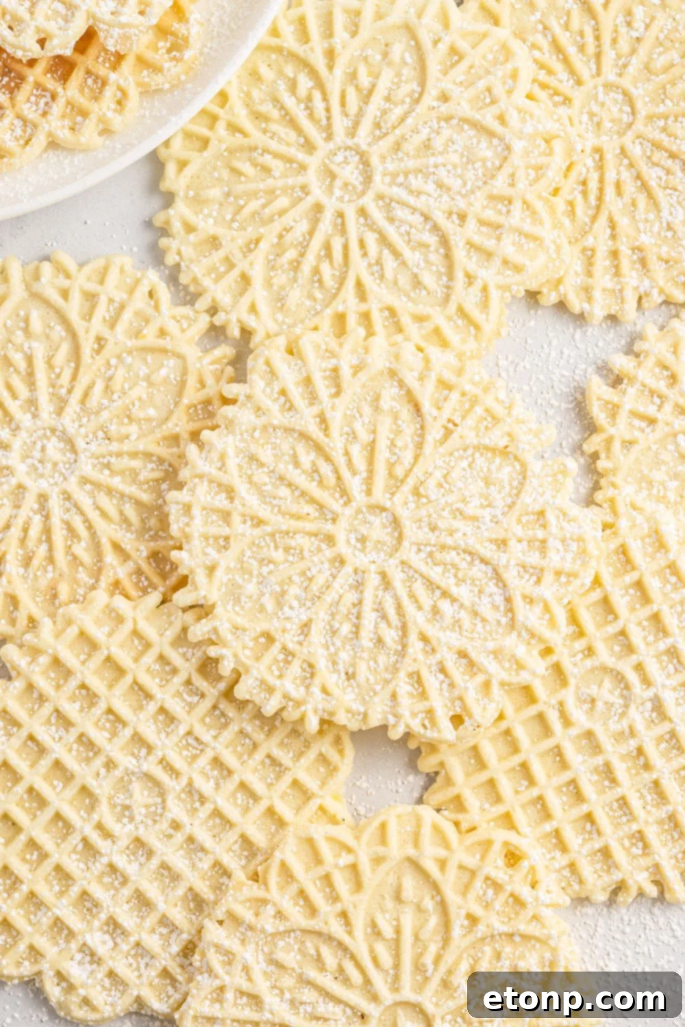 Pizzelles 25 Pizzelles spread out on table