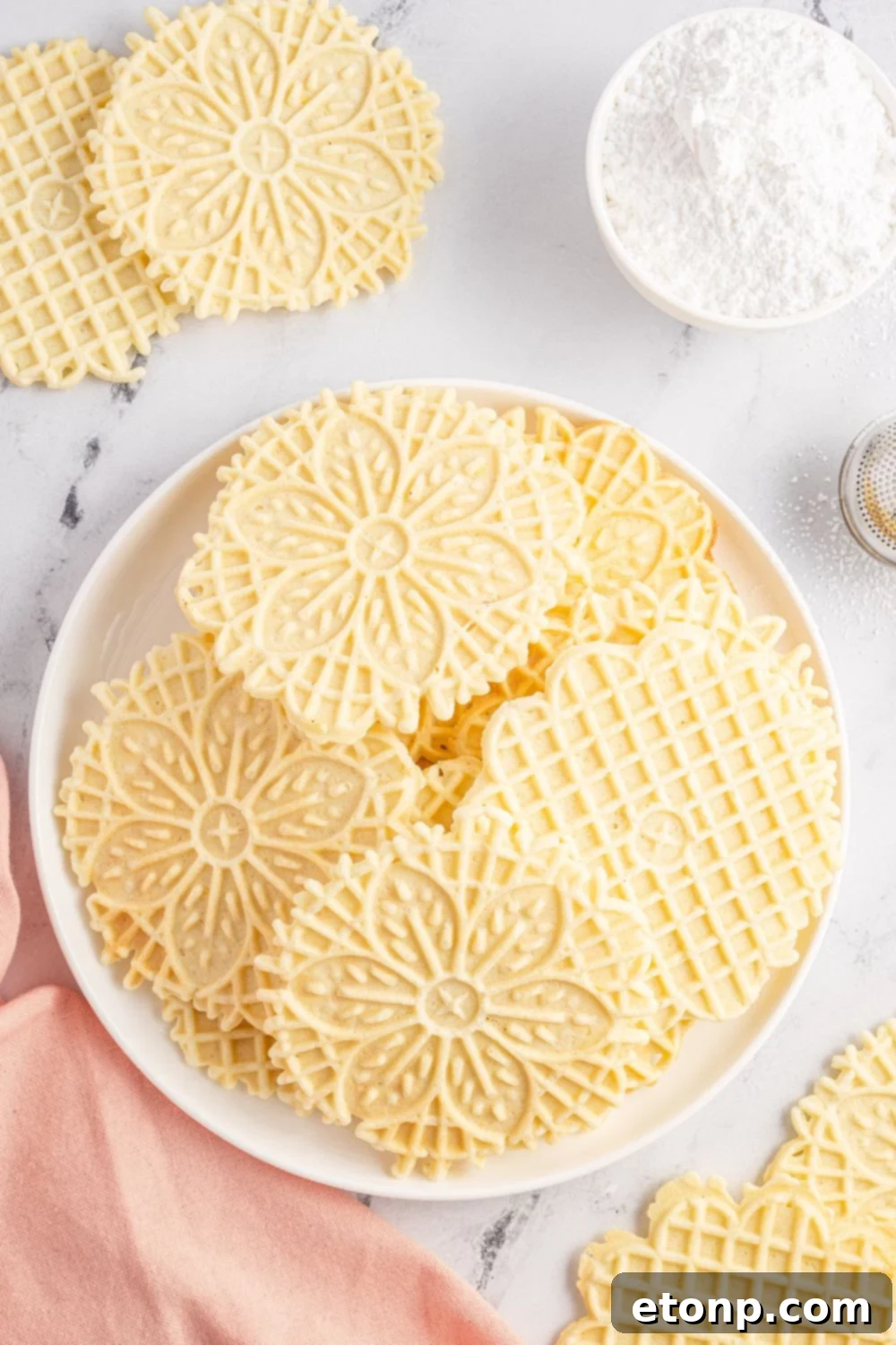 Pizzelles 7 plate with pizzelle cookies on it