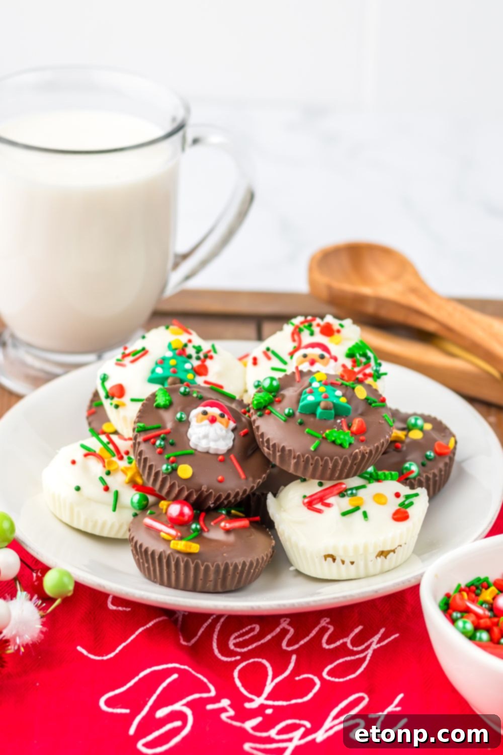 Christmas Peanut Butter Cups on table with milk and such on table