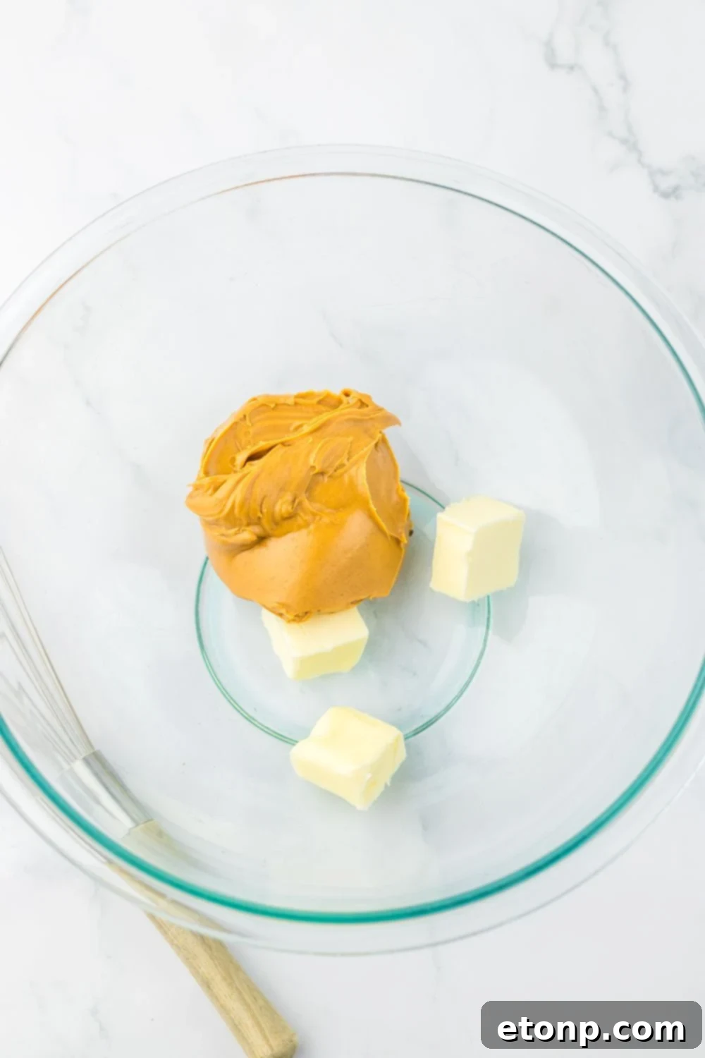 Peanut butter and butter in a glass bowl