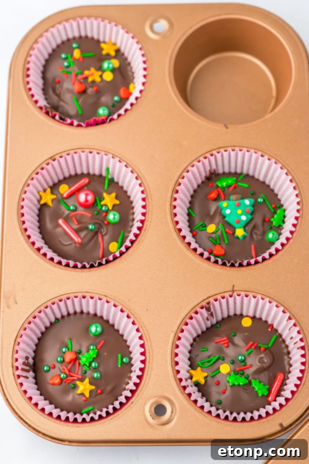 Homemade Reese cups in a muffin tin