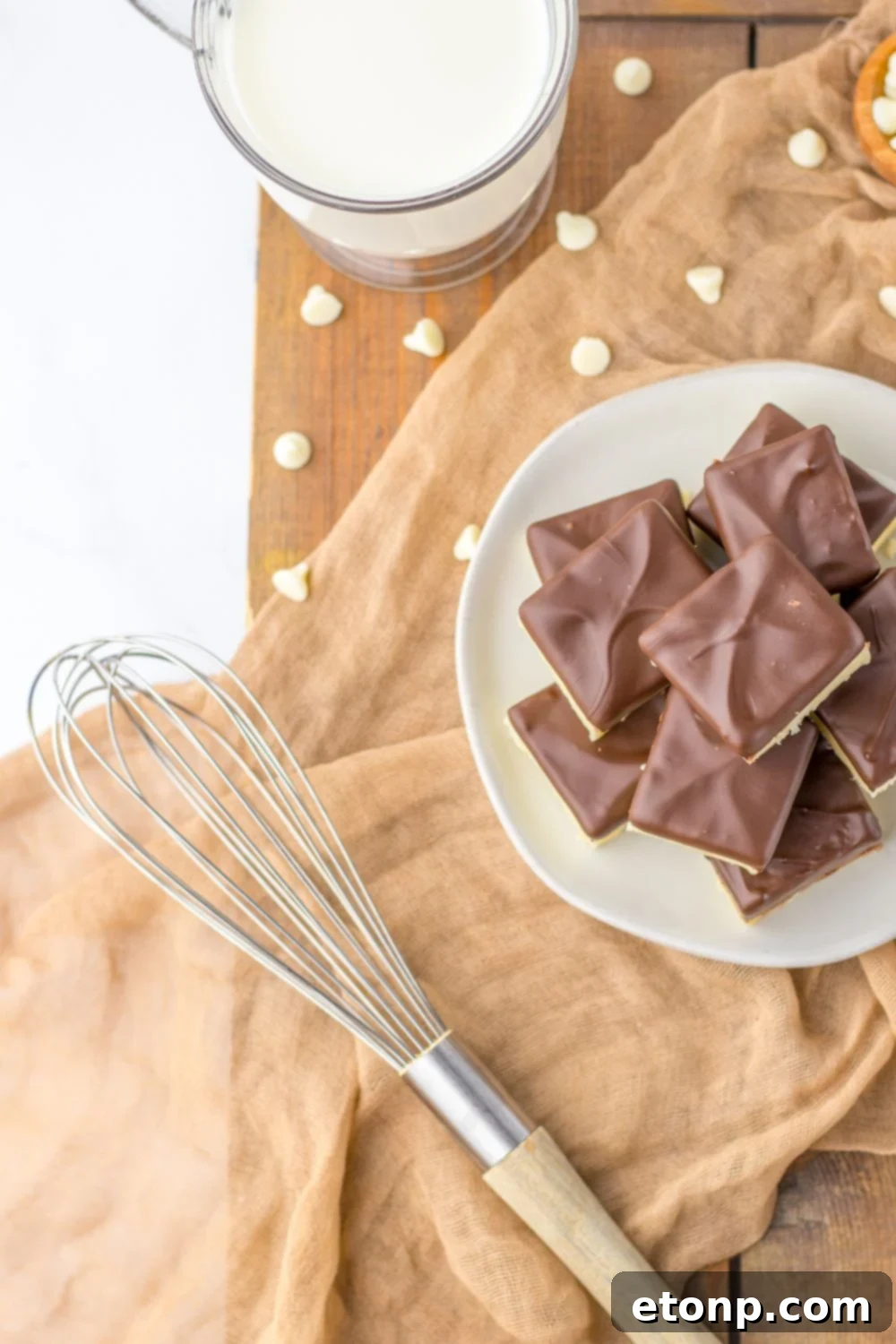 fudge on plate with whisk to the side