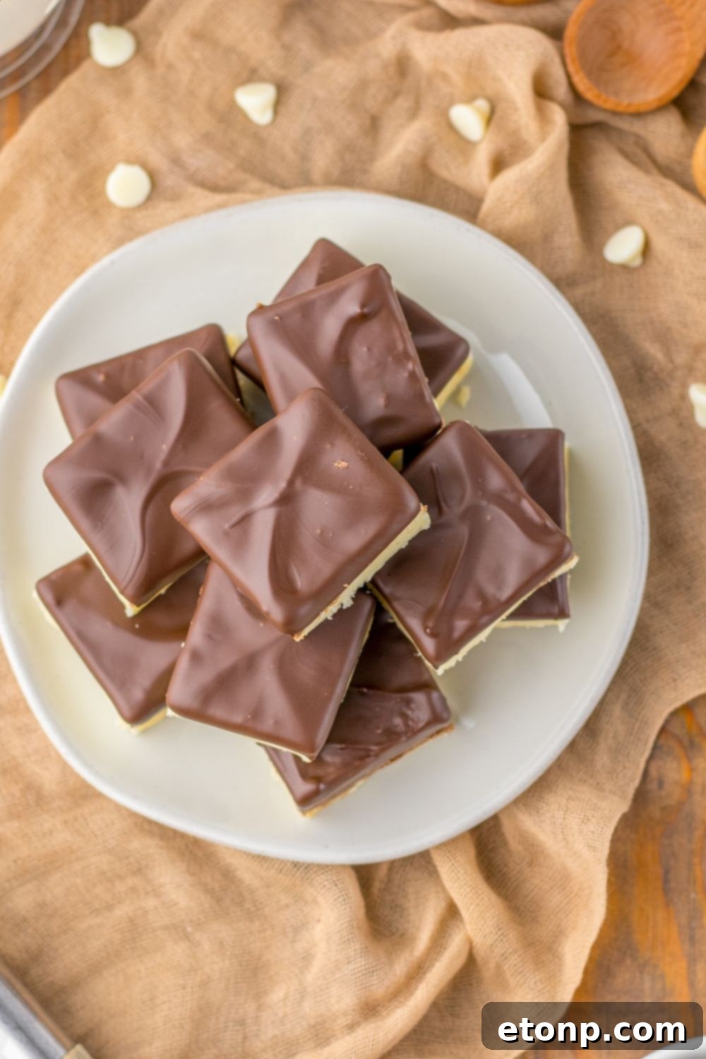 Boston Cream Pie Fudge stacked on a plate