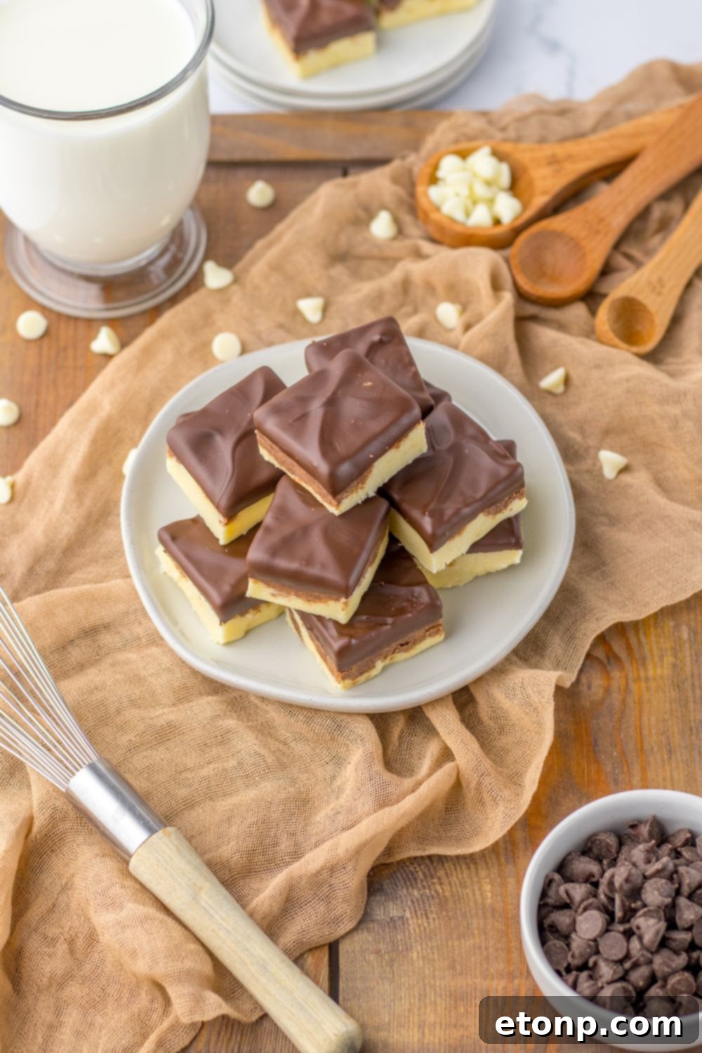 fudge on table with chocolate chips and items around it
