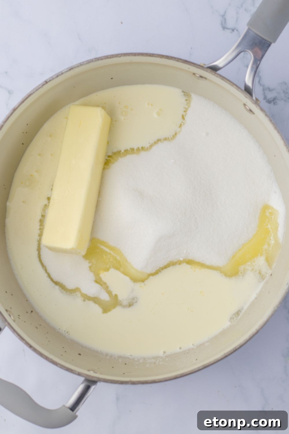butter and sugar mixture in a pan on table