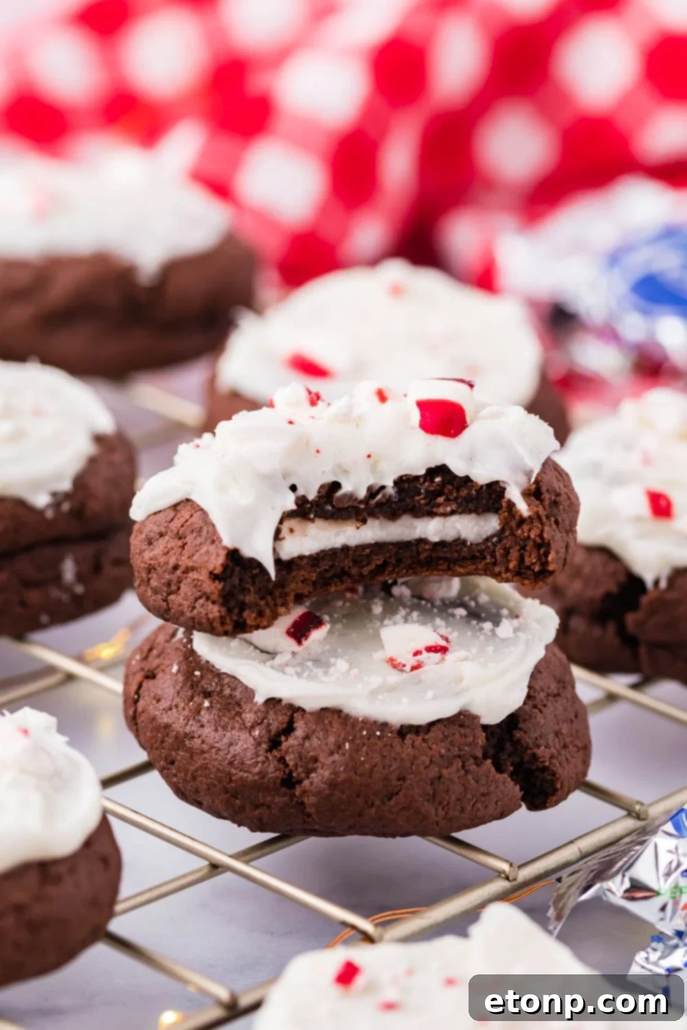 Molten Peppermint Patty Chocolate Cookies 2 Chocolate peppermint cookies arranged on a festive table setting