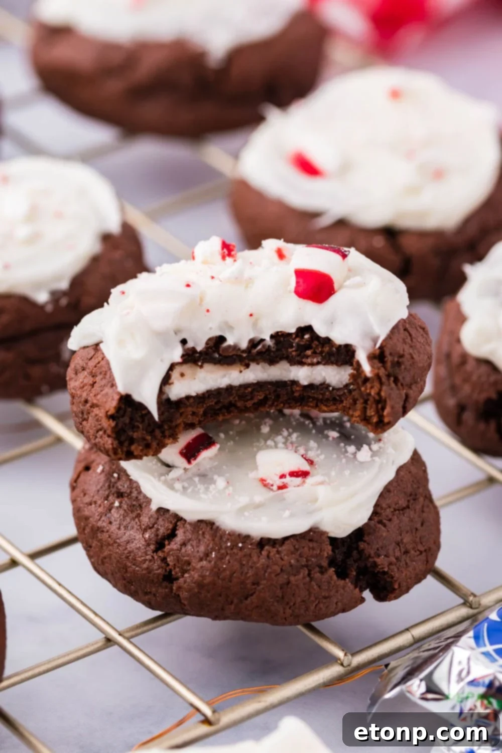 Molten Peppermint Patty Chocolate Cookies 12 York Peppermint Patty cookies cooling on a wire rack