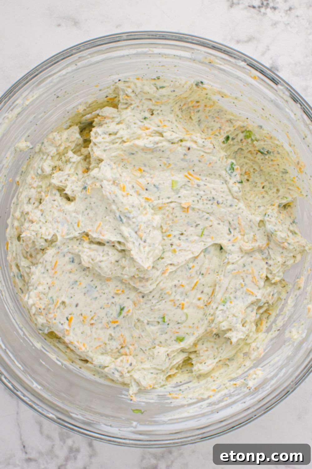 Cheese ball mixture in a bowl, ready for shaping