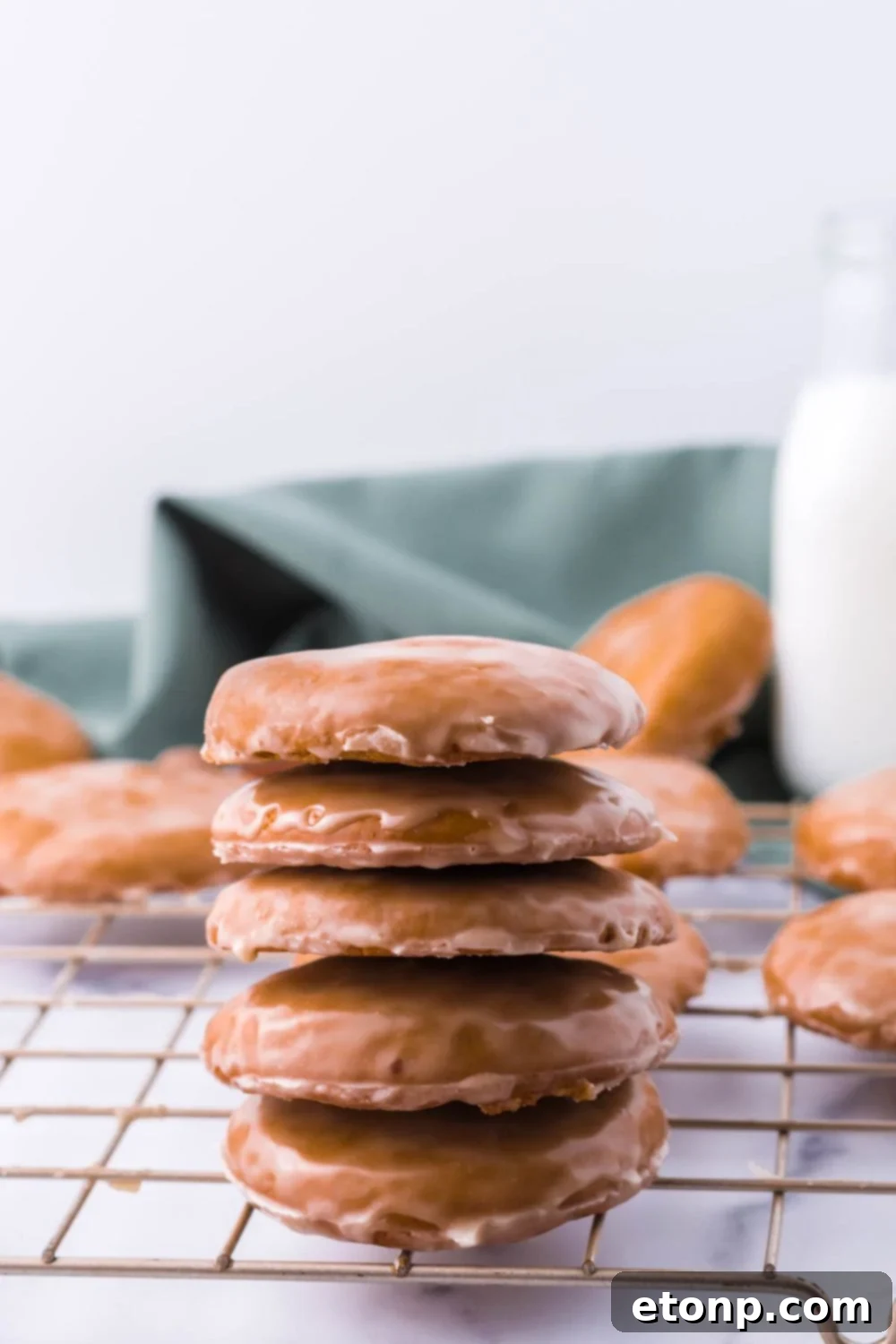 Cookies stacked on a cooling rack, ready to be stored or served