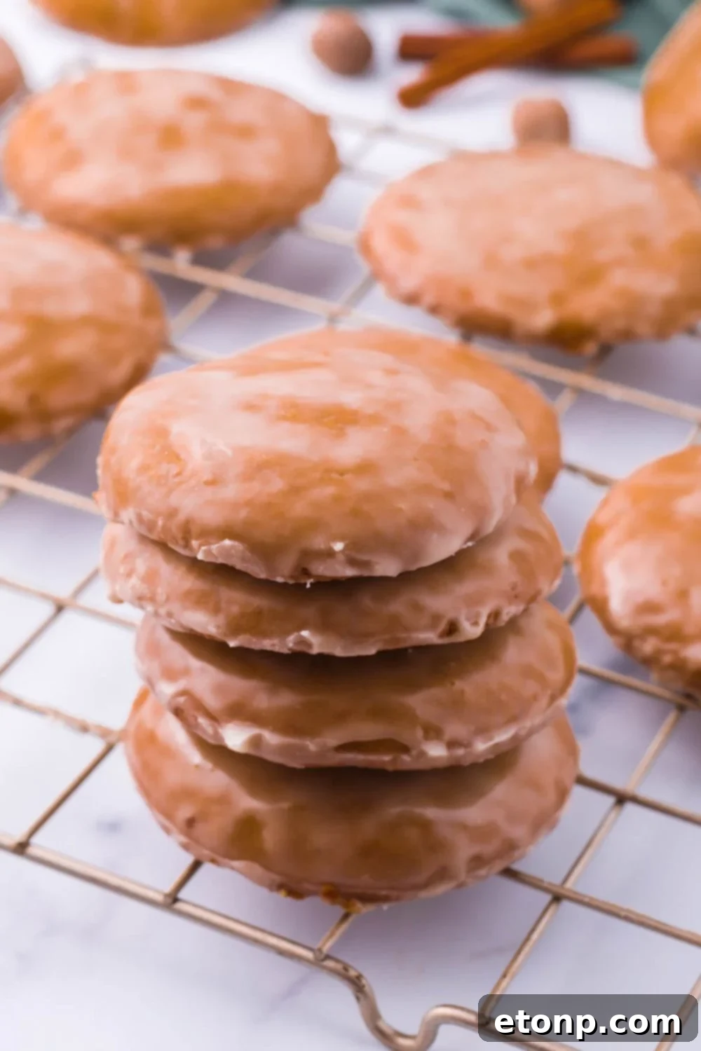Stacked cookies on a cooling rack, showing their even size