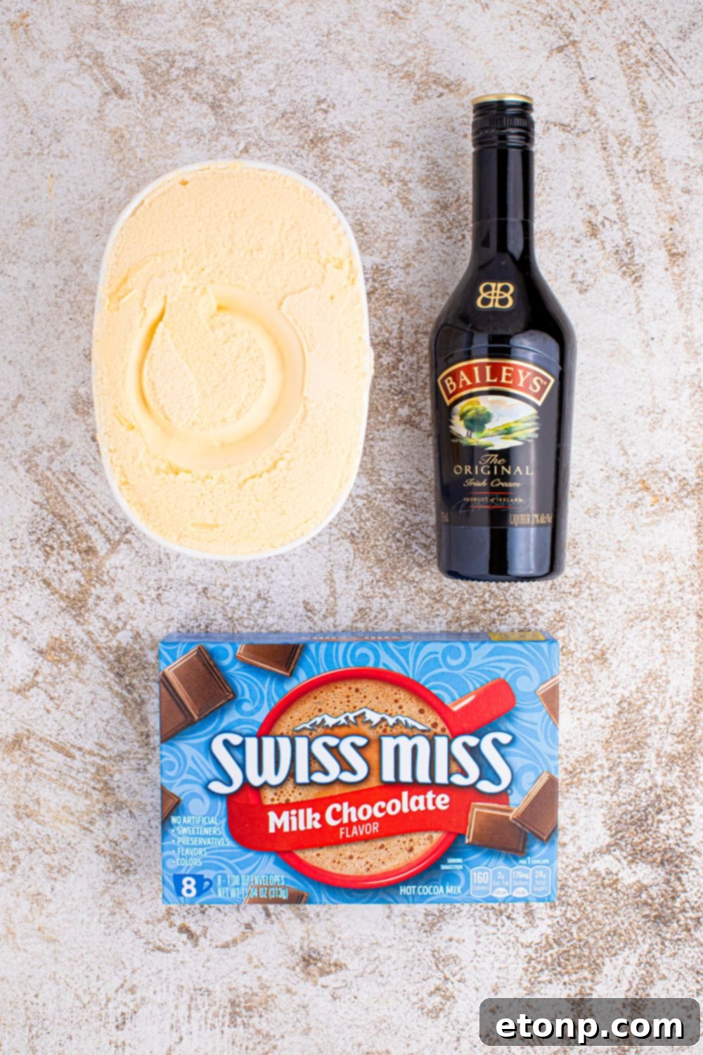 Naughty Snowman's Brew 6 ingredients for making a snowman drink on table