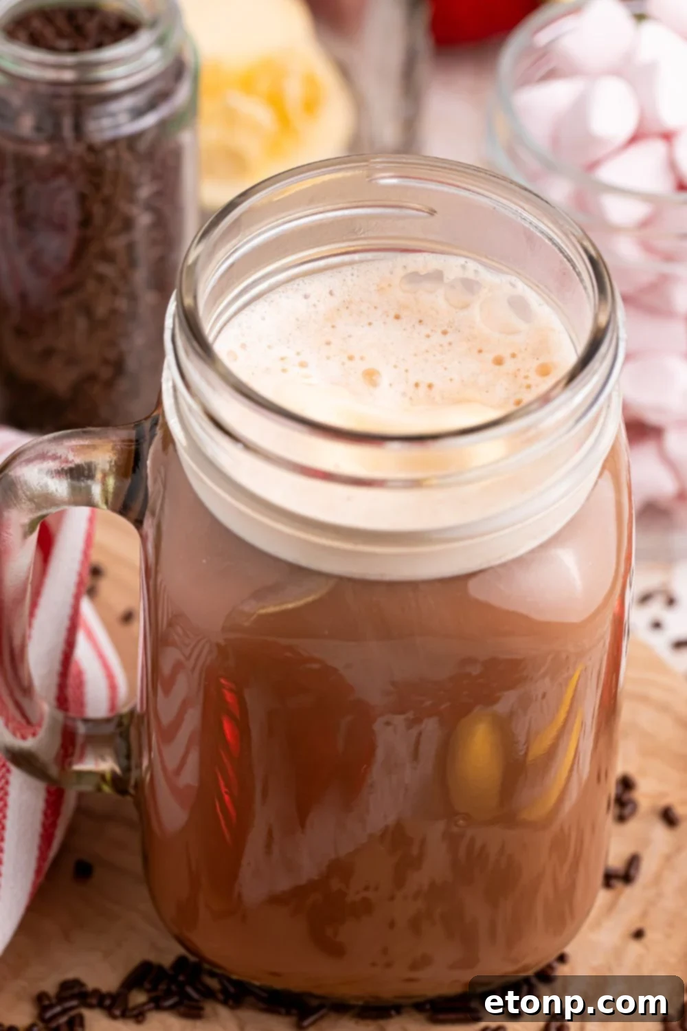 Naughty Snowman's Brew 8 dirty snowman drink in a glass with a side view to show the creamy top