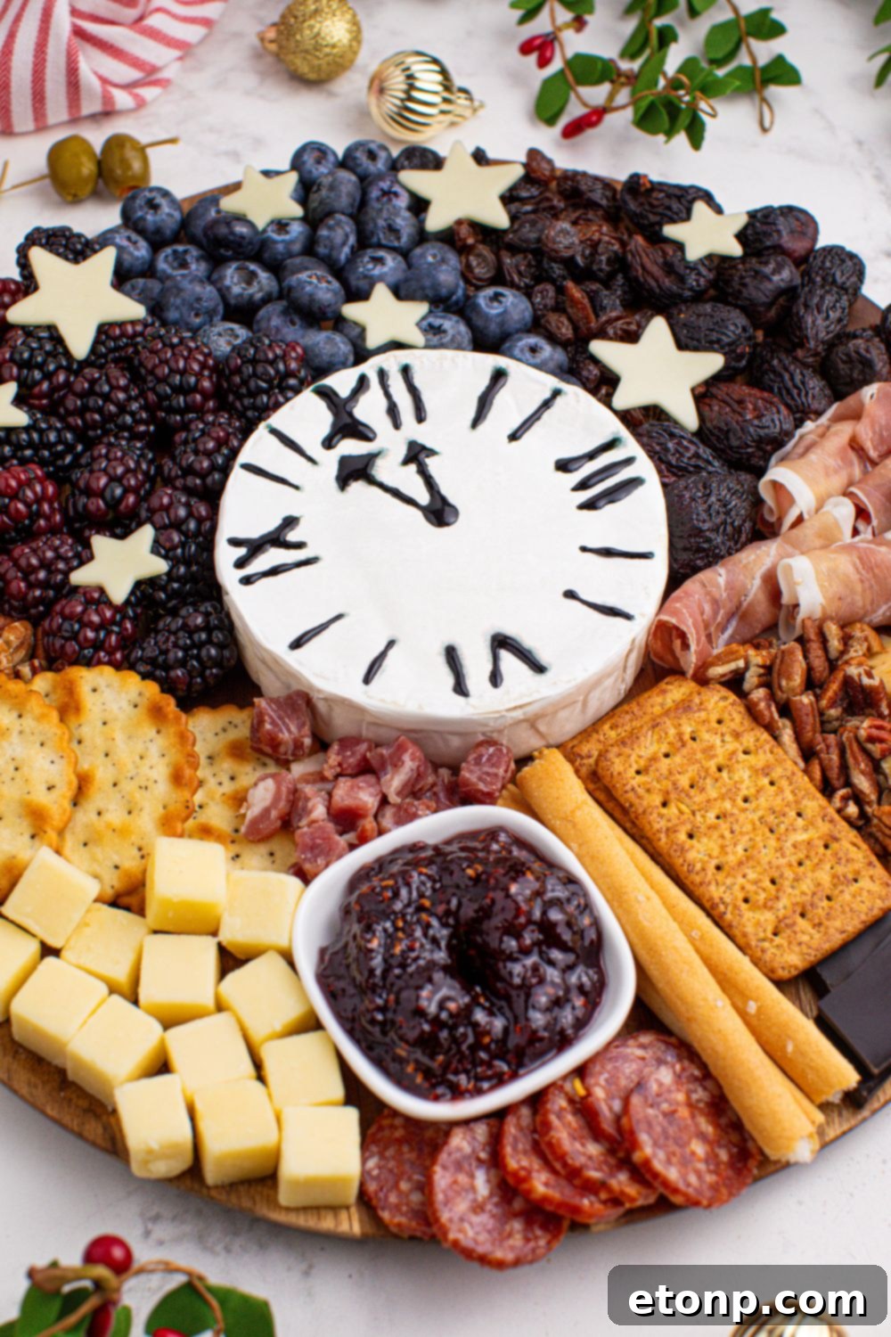 overhead side view of the New Year's Eve Charcuterie Board on a marble counter