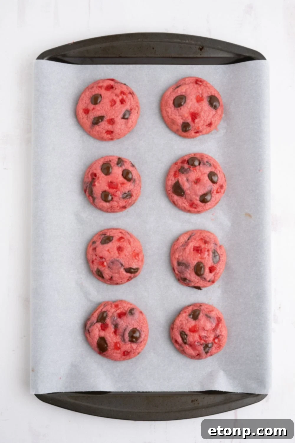 baked Cherry Chocolate Chip Cookies on a cookie sheet