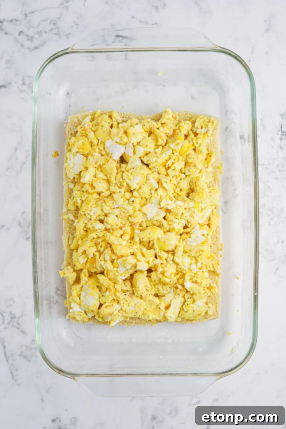 scrambled eggs on top of slider buns for the process images for Breakfast Sliders