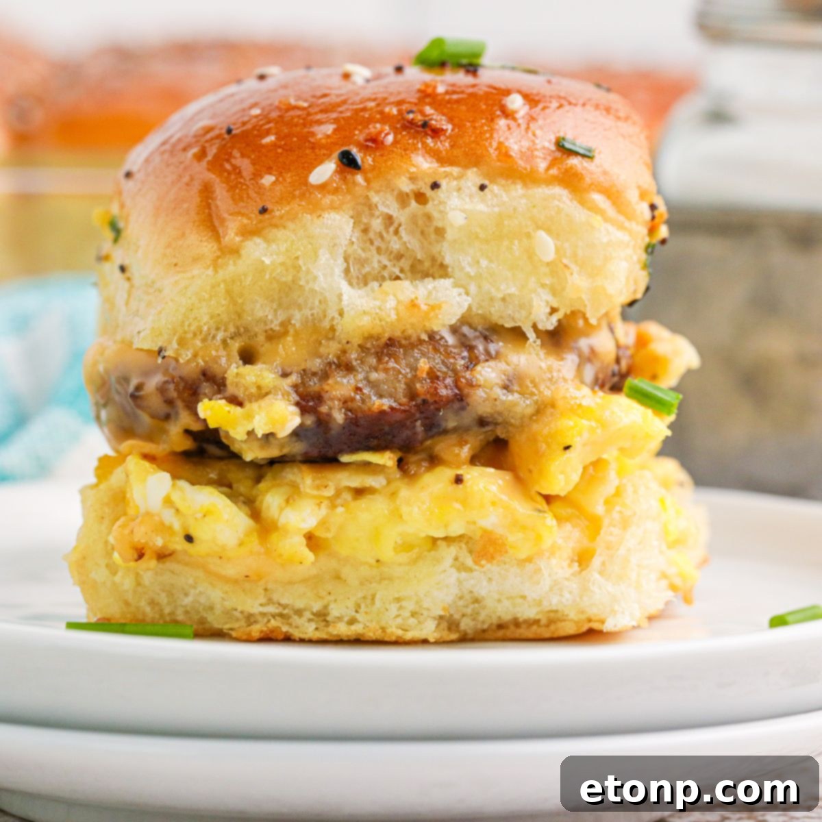 Breakfast Sliders with Sausage on a plate to see what the sandwich is full of 