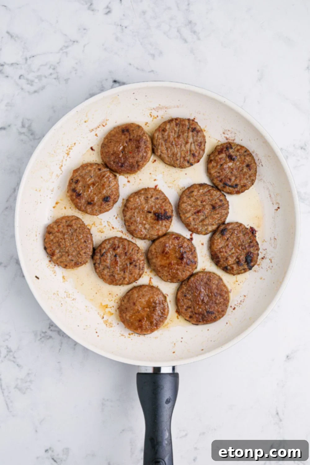 cooked Breakfast Sliders in a skillet 