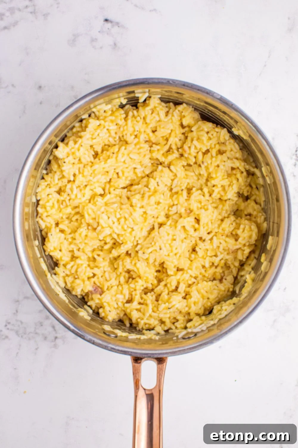 Souper Rice cooked in a saucepan on the table 
