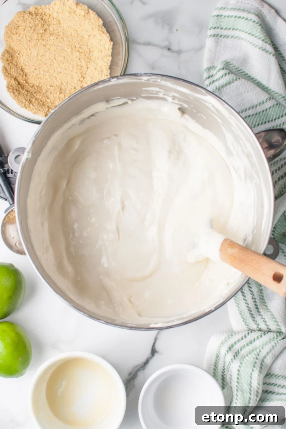 Crumbl Key Lime Pie Cookie filling in a mixing bowl all mixed