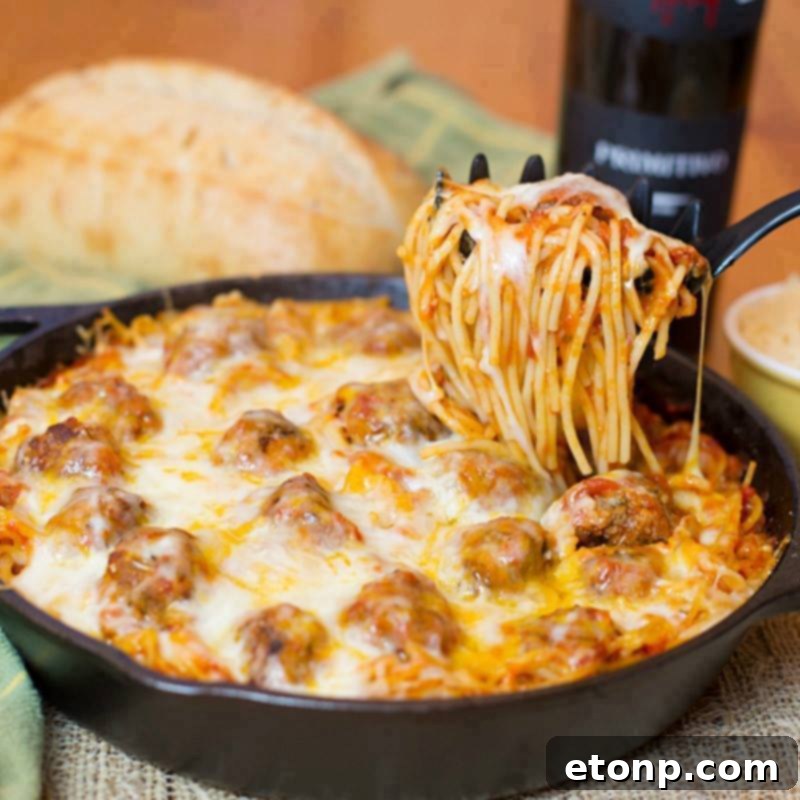 Hearty Baked Spaghetti and Meatballs, an ideal skillet meal for families.