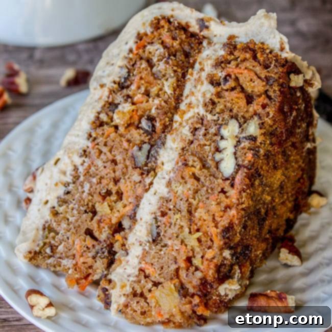 Decadent Carrot Cake with Maple Pecan Cream Cheese Frosting, a delightful dessert.