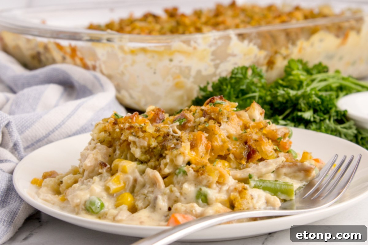 close up view of Chicken Stuffing Casserole on a white plate