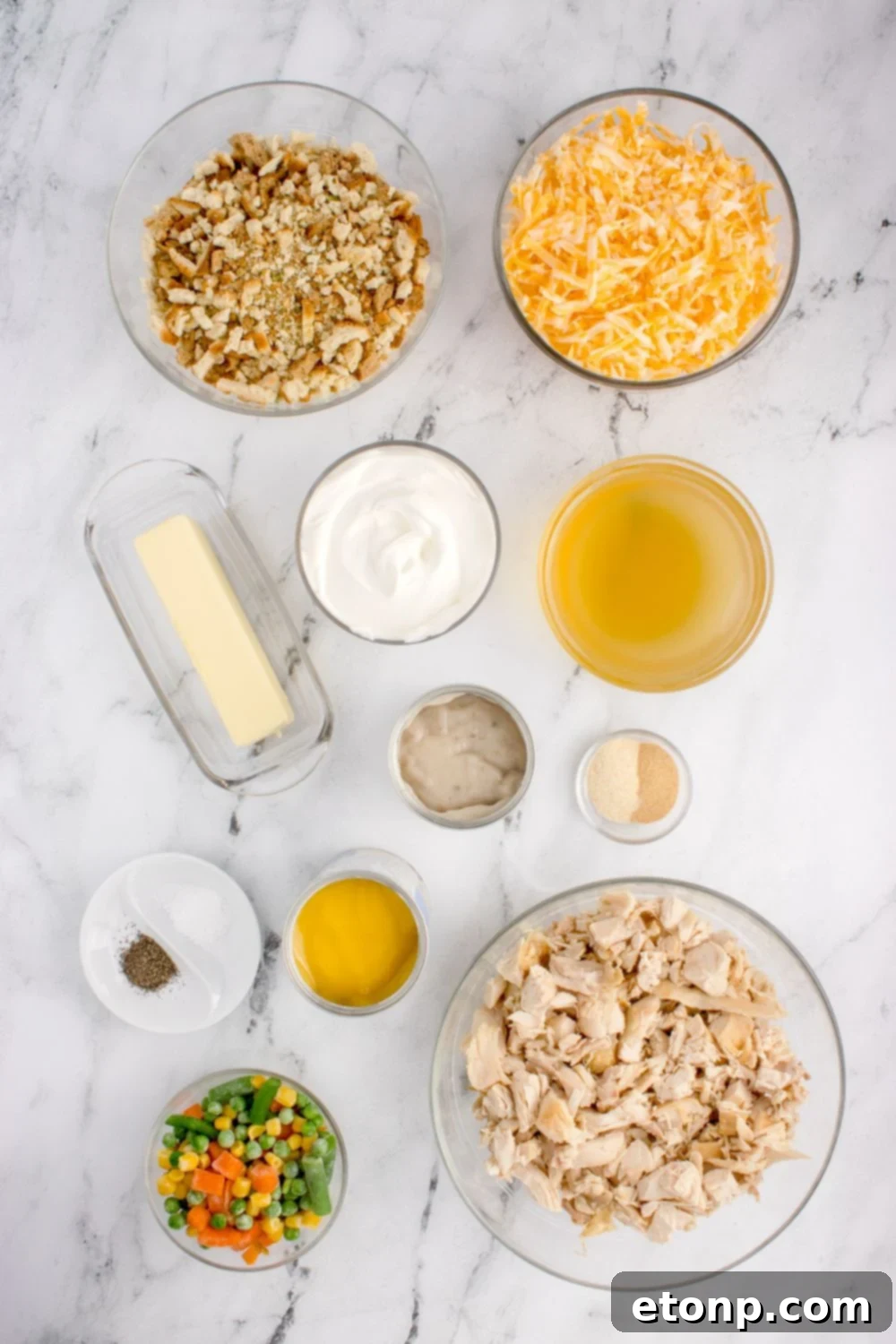 Chicken Stuffing Casserole ingredients in glass bowls sitting on table to showcase what you need for cassserole 