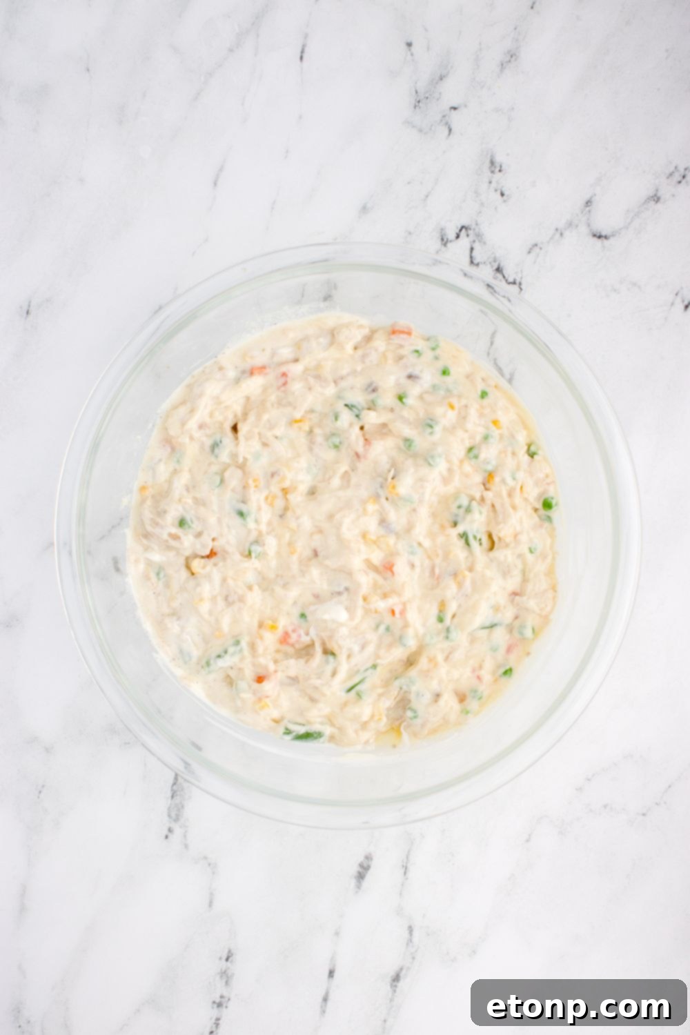 glass bowl with Chicken Stuffing Casserole filling in it 