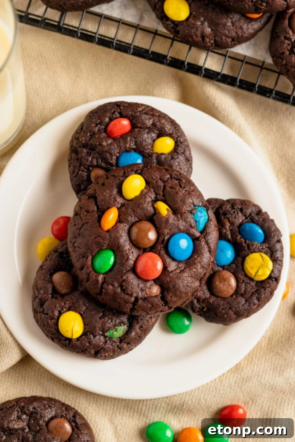 Chocolate M&M Cookies on a plate on table 