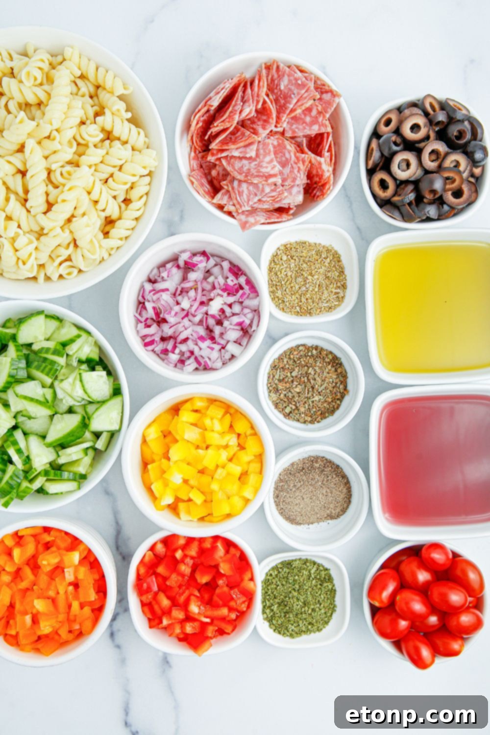 Vibrant Summer Pasta Salad 4 ingredients for Summer Pasta Salad in small white bowls on table