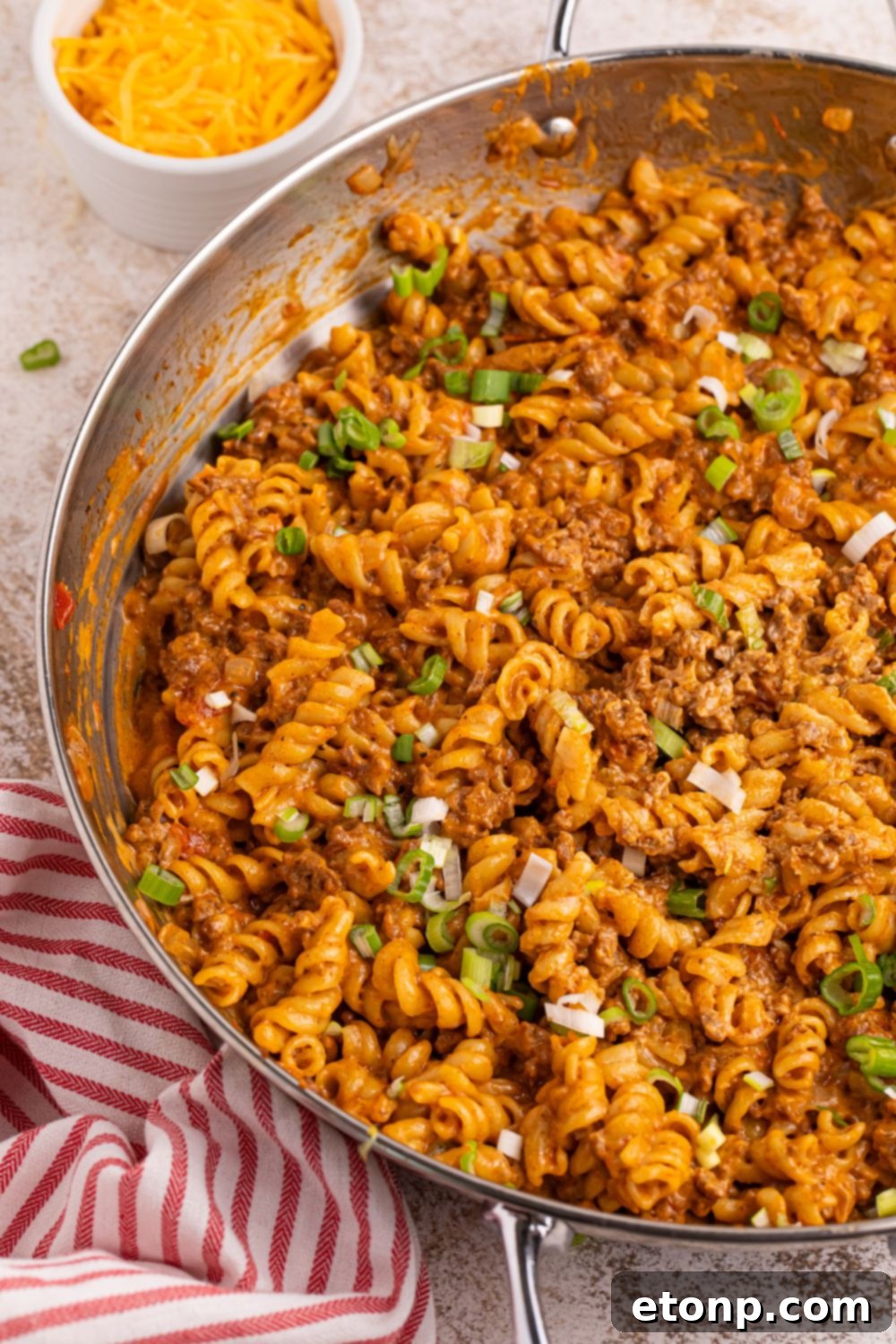 Taco Macaroni and Cheese in a skillet on the table 
