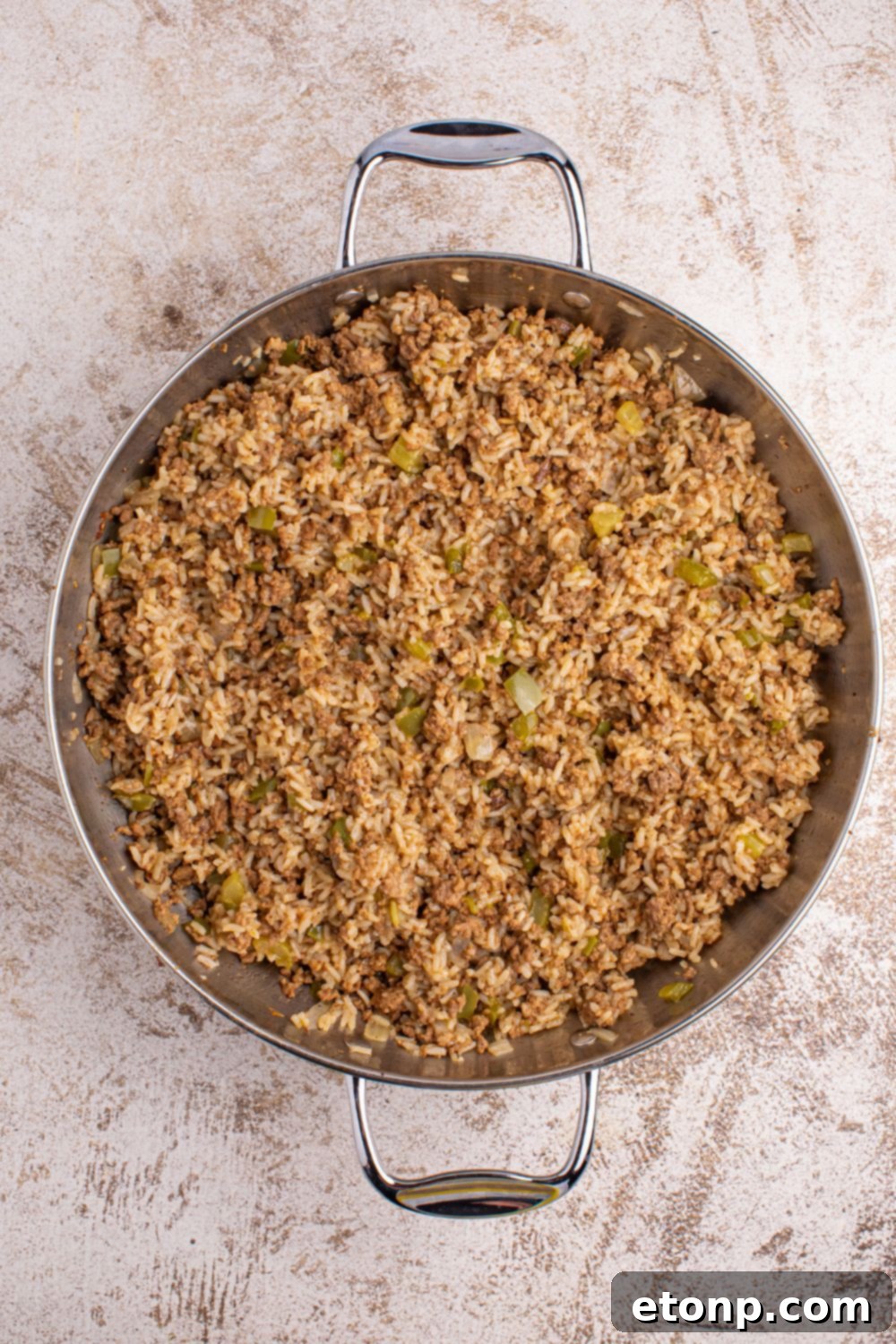 Cajun Dirty Rice 11 Dirty Rice in a pan sitting on table