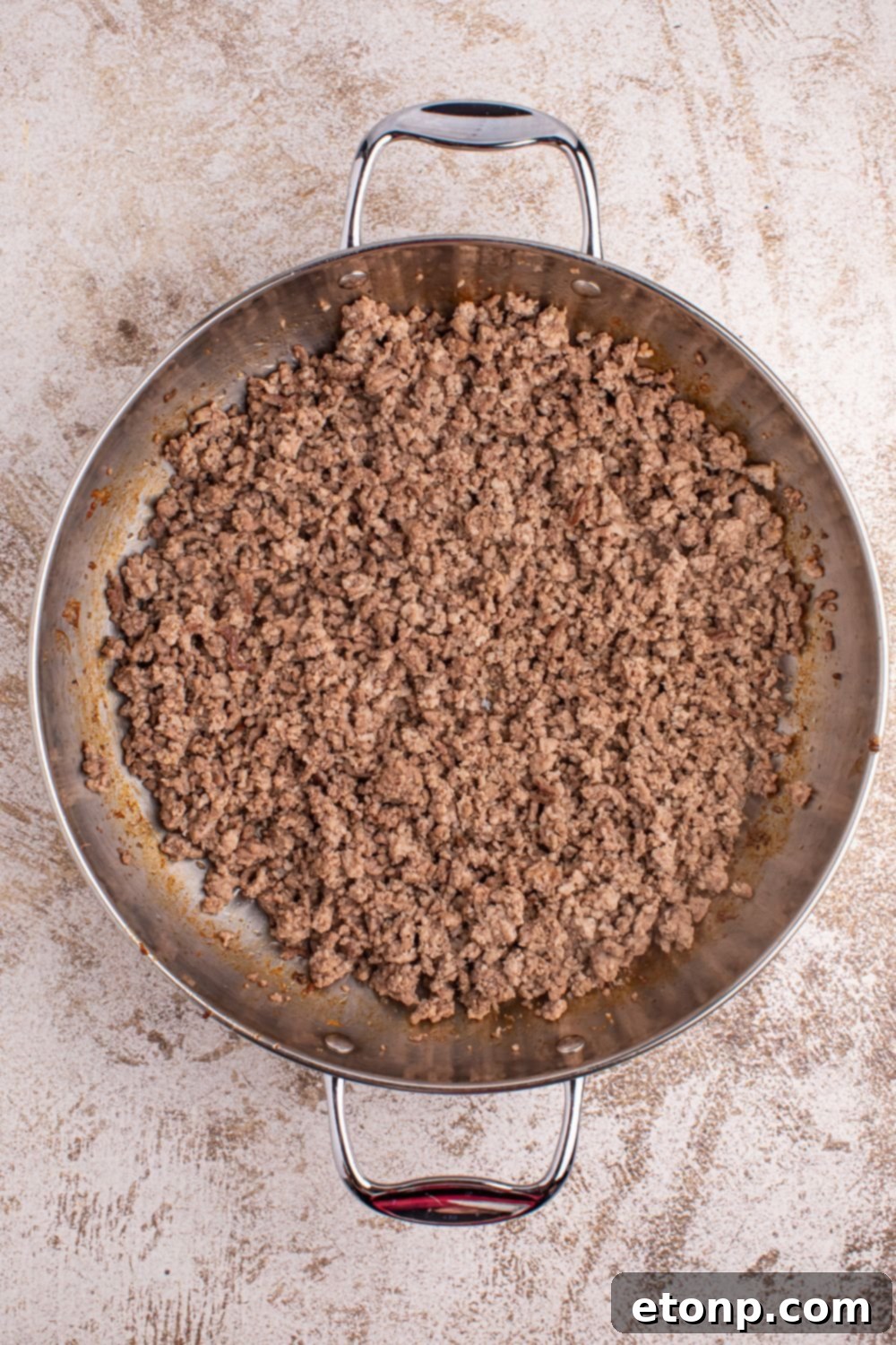 Cajun Dirty Rice 8 Dirty Rice - ground beef and sausage cooked up in pan