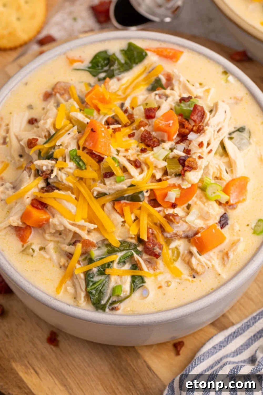 Creamy Ranch Chicken Soup 12 Crack Chicken Soup in a bowl with cheese and bacon topping