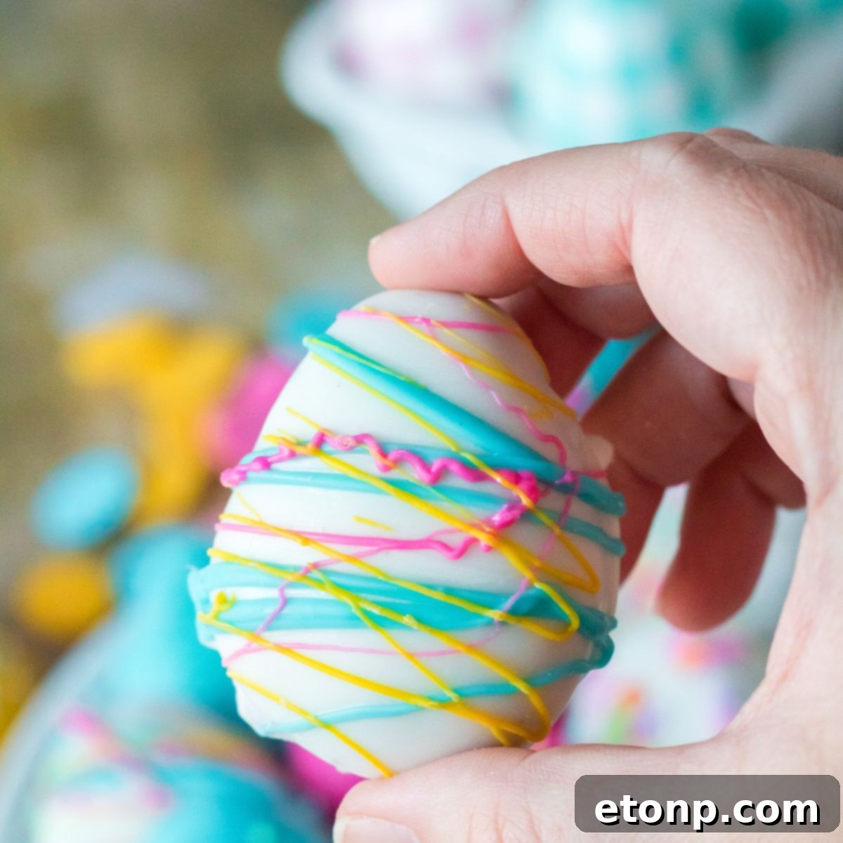 Easter Egg Oreo Truffle in hand 